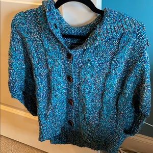 Green American eagle sweater.